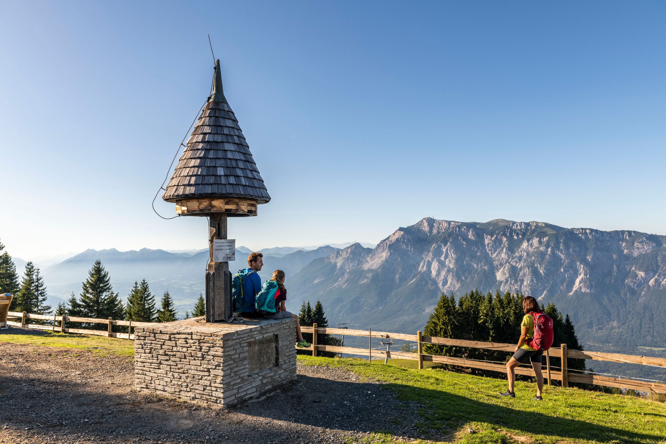 The wayside shrine of Dreiländereck with hikers